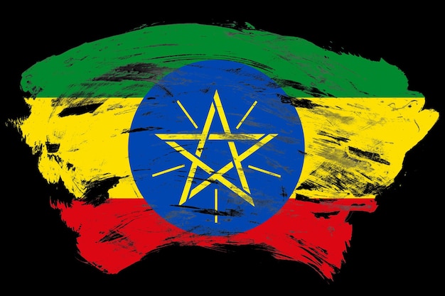 Photo ethiopia flag on distressed black stroke brush background