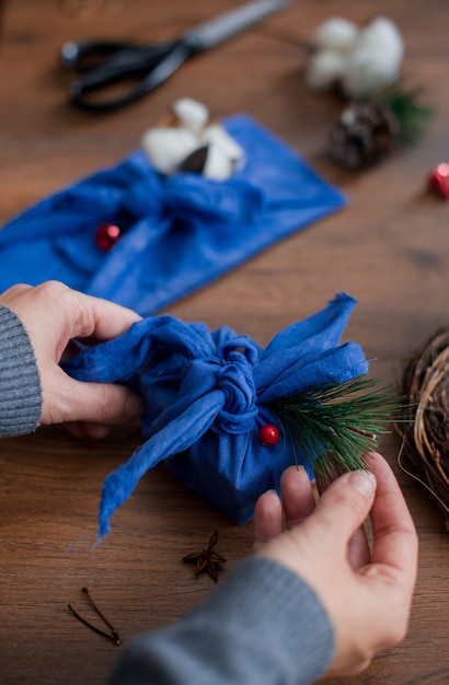 Etnical Christmas gift with pine branches