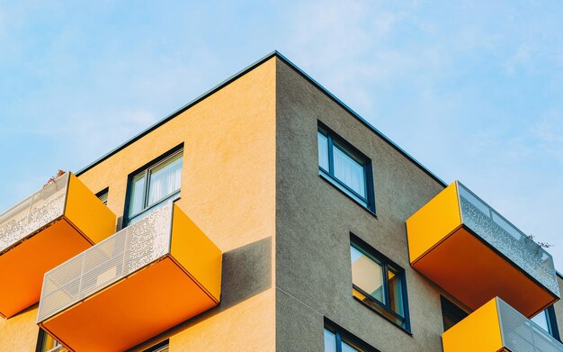 EU Balconies of apartment house and home modern residential building architecture concept. Place for copy space. Blue sky