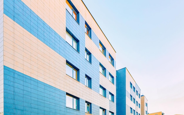 EU Complex of new apartment buildings with outdoor facilities and footpath.