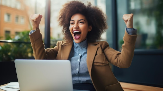 Photo euphoric african american woman celebrating success online