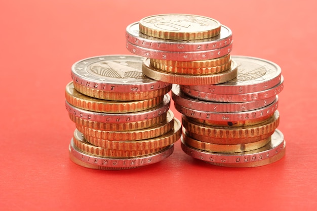 Euro coins on color background