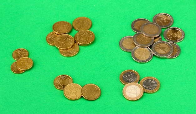 Euro coins on color background