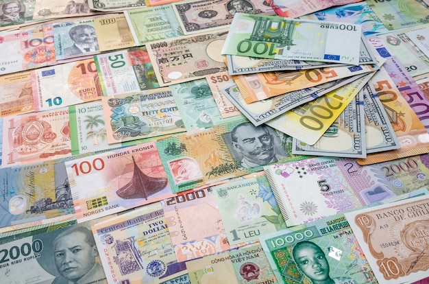 Euro and dollar banknotes on world money collection