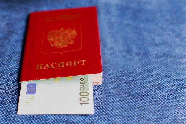 Euro in the Russian passport on a blue background