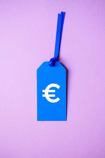 Photo euro sign on the blue price tag for sales