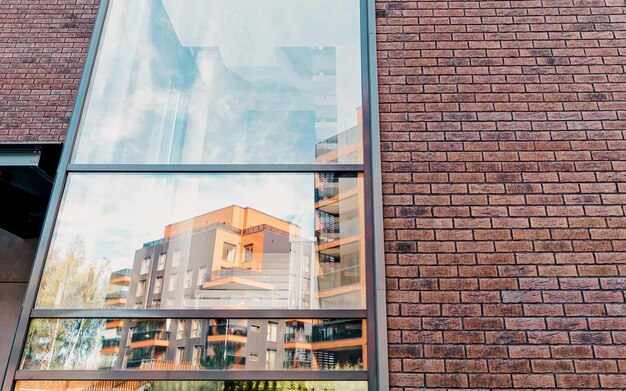 Europe Reflection in a glass window of Modern architectural complex of apartment residential buildings. And outdoor facilities.