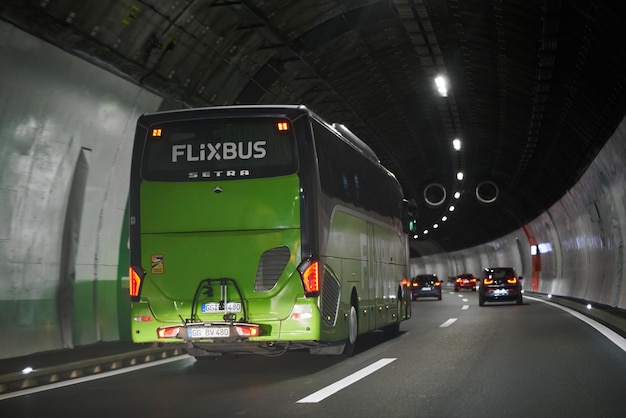 Europe Switzerland 14042023 a Flixbus bus in the tunnel under Alps mountains The Flixbus is a German brand offering intercity coach services in European countries and in the USA