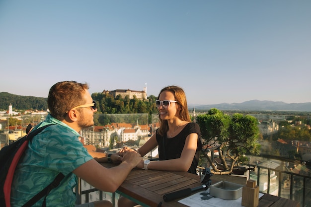 Europe travel Couple of lovers in the cafe on the background in Ljubljana Slovenia