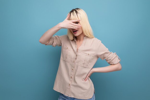 European blond woman with regrown hair roots