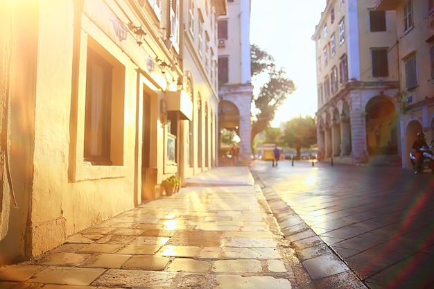 european city street blurred background outside summer buildings