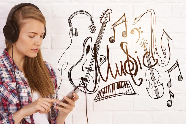 European girl listening to music