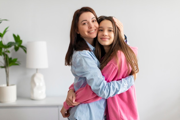 european mother and teen daughter embracing enjoying tender moment together trusted relationships