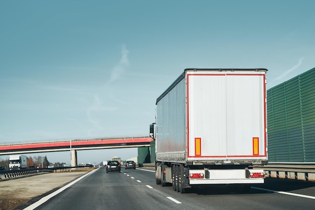 European SemiTrailer Truck Hauling Goods on a Highway Road