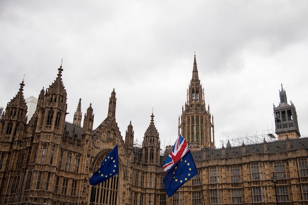 European union and british union jack flag flying together a\
symbol of the brexit eu referendum