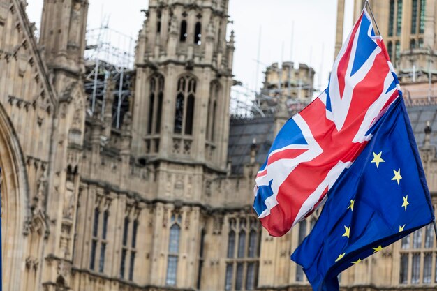 european union and british union jack flag flying together a symbol of the brexit eu referendum