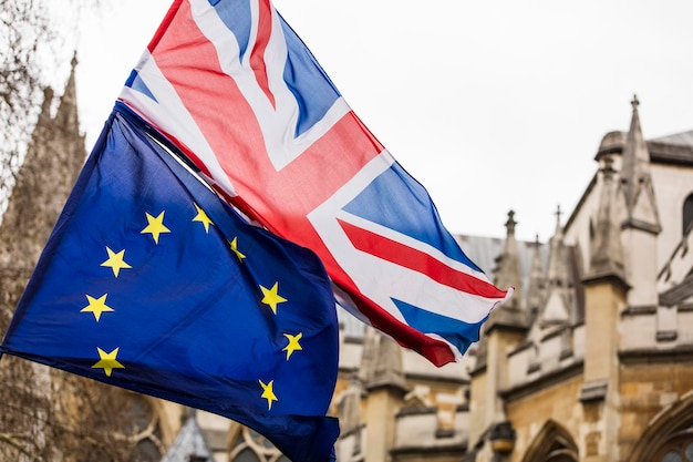 European Union and British Union Jack flag flying together A symbol of the Brexit EU referendum