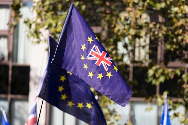 European union and british union jack flags flying together\
brexit concept