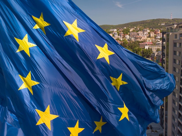 European union flag Against City Varna at summer day Bulgaria