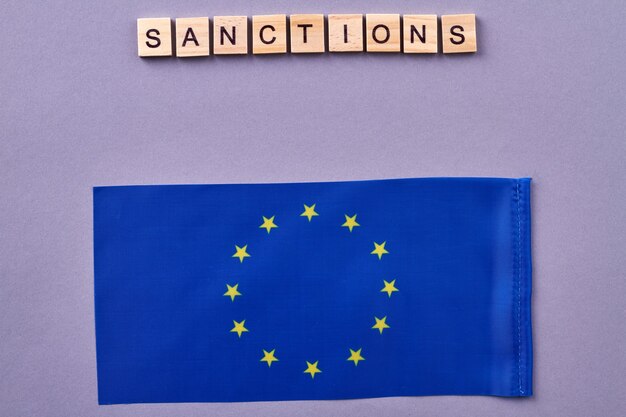 European Union sanctions concept. Isolated on purple background.
