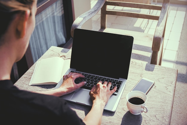 European woman using laptop