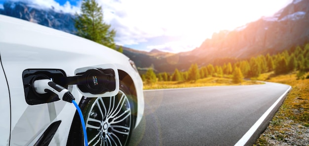 Stazione di ricarica per veicoli elettrici per auto elettriche nel concetto di energia verde e viaggi ecologici