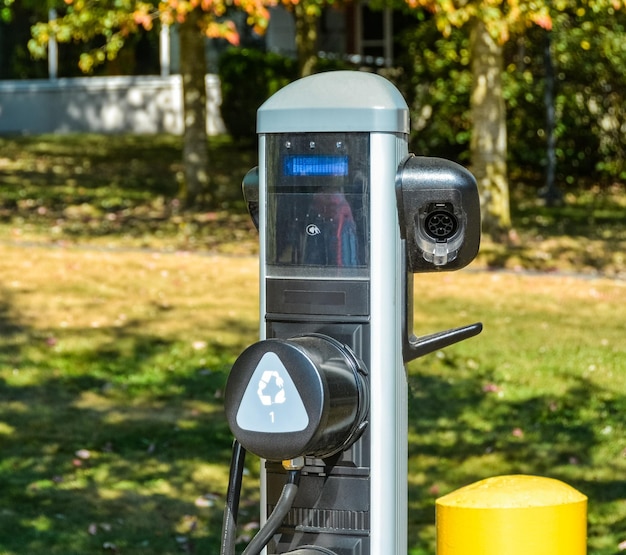 Ev charging station at work charge point with empty plug ports