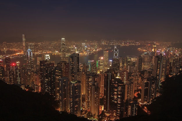 Evening aerial view panorama of Hong Kong skyline and Victoria Harbor