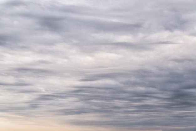 Evening cloudy sky over the sea in summer