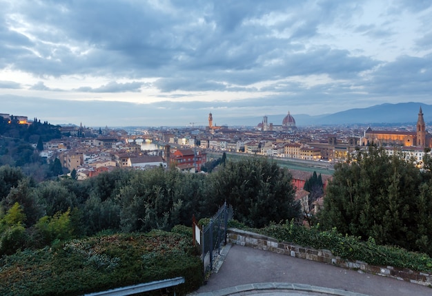 Evening Florence City top view Italy, Tuscany on Arno river.