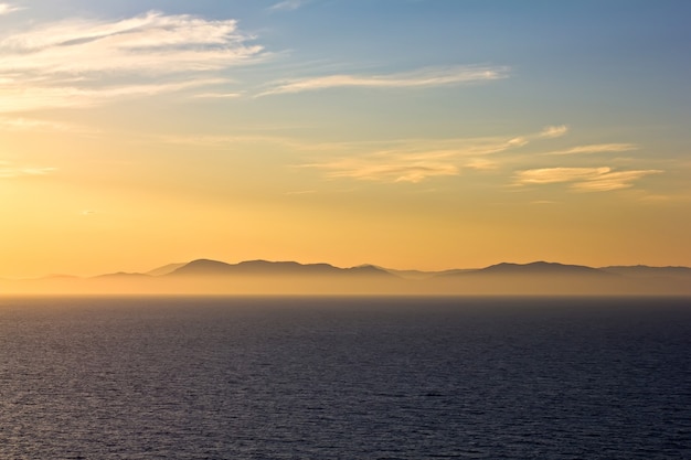 Evening horizon at sea by sunset