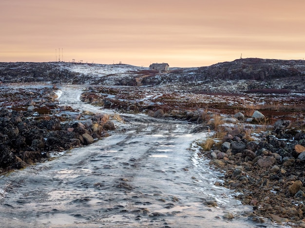 Evening mountain trail. A winding mountain trail among the snow-