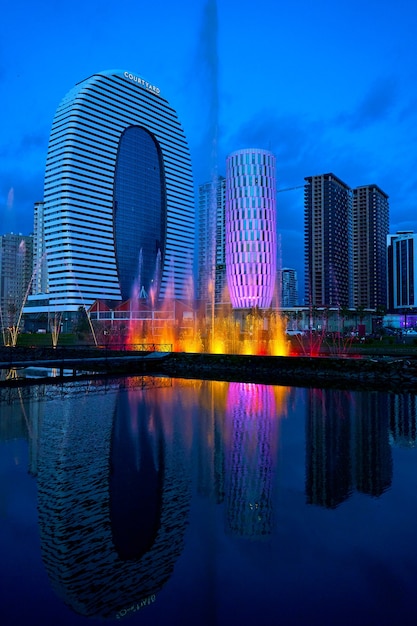 Evening panorama of the architecture of modern buildings on the seashore in Batumi