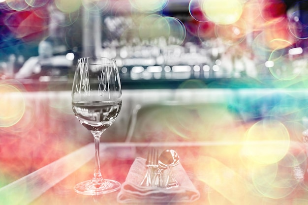 evening in a restaurant, blurred abstract background, bokeh, alcohol concept, wine glasses in a bar