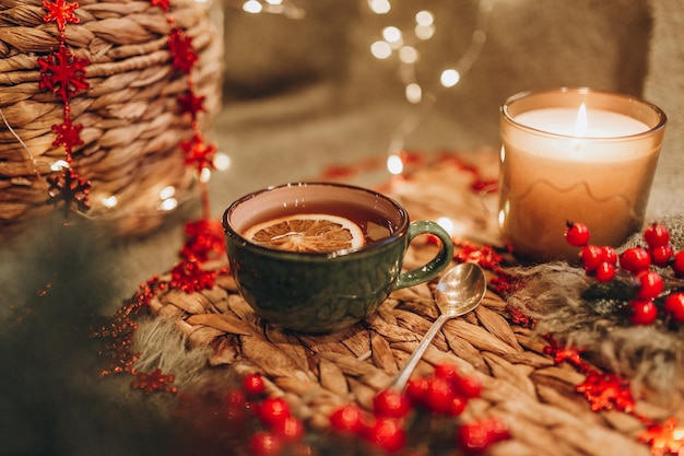 Evening tea party with Christmas lights hot tea and candy