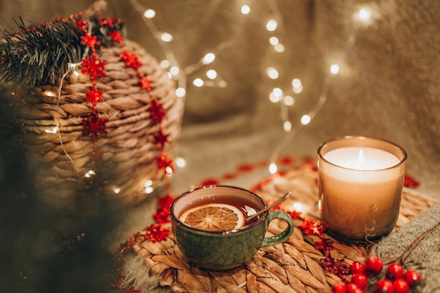 Evening tea party with Christmas lights hot tea and candy