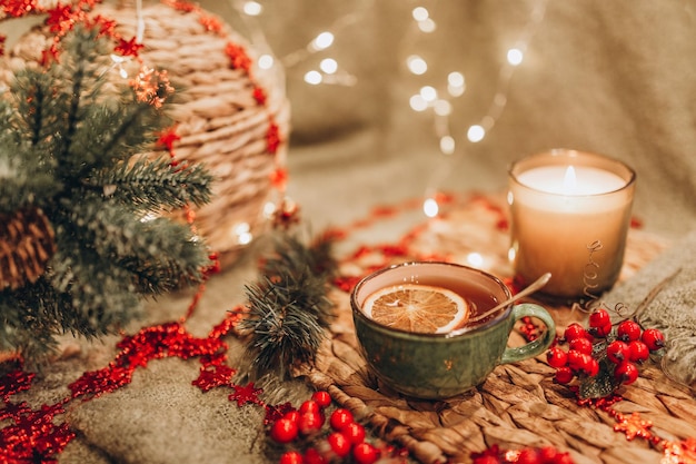 Evening tea party with Christmas lights hot tea and candy