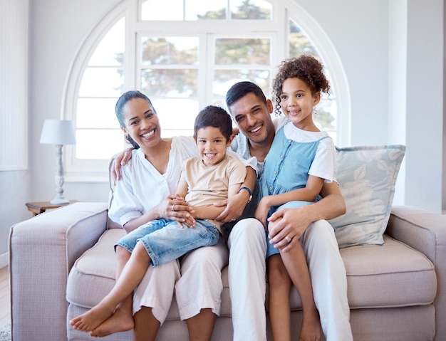 Every second we spend together is worth it. Portrait of a happy family bonding together at home.