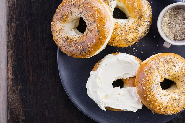 Everything bagels with seeds served with cream cheese