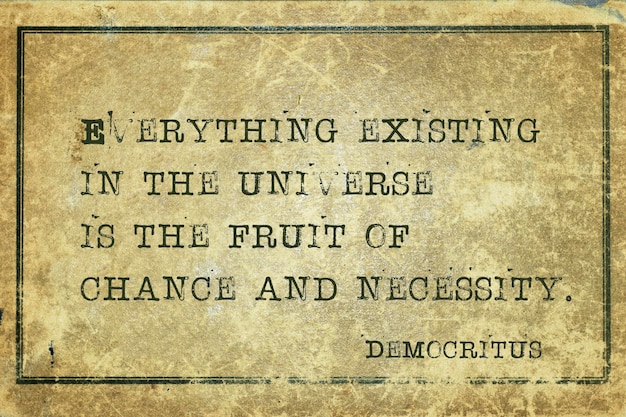 Everything existing in the universe is the fruit of chance and necessity  ancient Greek philosopher Democritus quote printed on grunge vintage cardboard