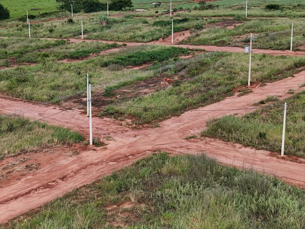 Photo ew subdivision for houses dirt road and power poles