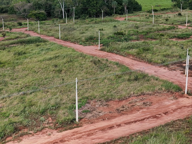 Photo ew subdivision for houses dirt road and power poles