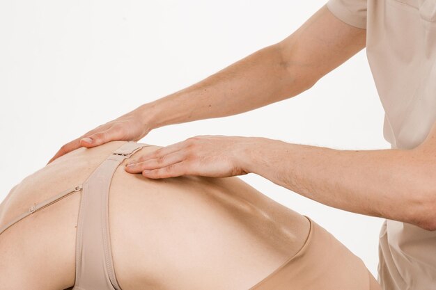 Photo examination the patient for kyphosis kyphosis is a spinal disorder in which an excessive curve of the spine results in an abnormal rounding of the upper back