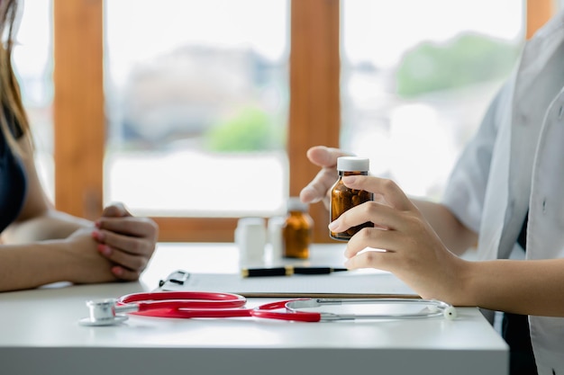 An examination room atmosphere in a hospital where doctors and patients are examining and diagnosing and prescribing medications for symptomatic treatment The concept of disease diagnosis