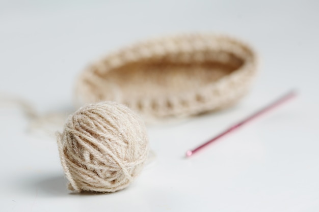 Example Knitting, A Tangle Of Brown Yarn And A Hook