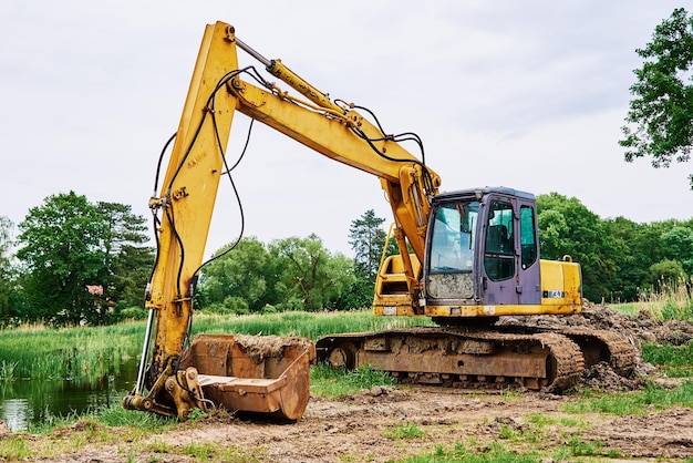 Photo excavator on construction site