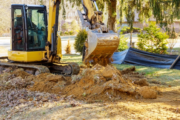 Excavator machine unloading soil earth moving