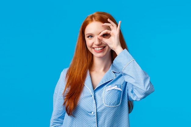 Excellent choice right here. Charismatic satisfied redhead female in nightwear showing okay