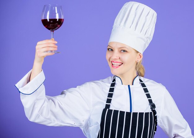 Excellent taste Sommelier skills Serving wine at restaurant Woman chef hold glass of wine Outstanding toasts that work for any occasion Which wine serve with dinner Sommelier enjoy wine