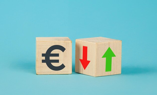 Exchange rate wooden cubes currency selection concept on wooden